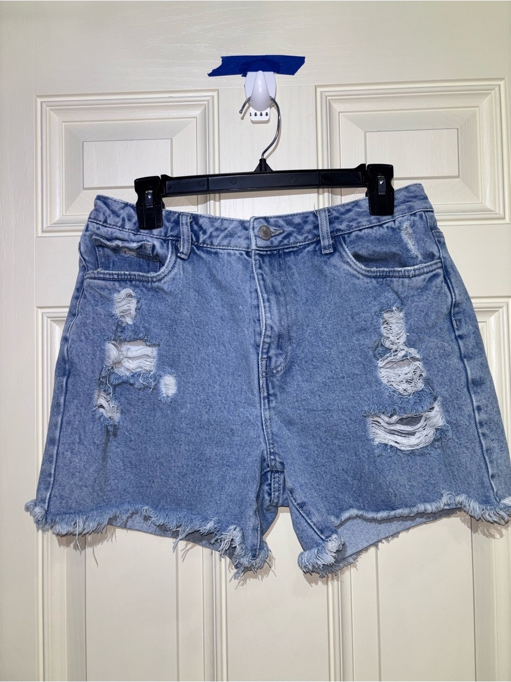 High-Rise Light Blue Distressed Denim Shorts